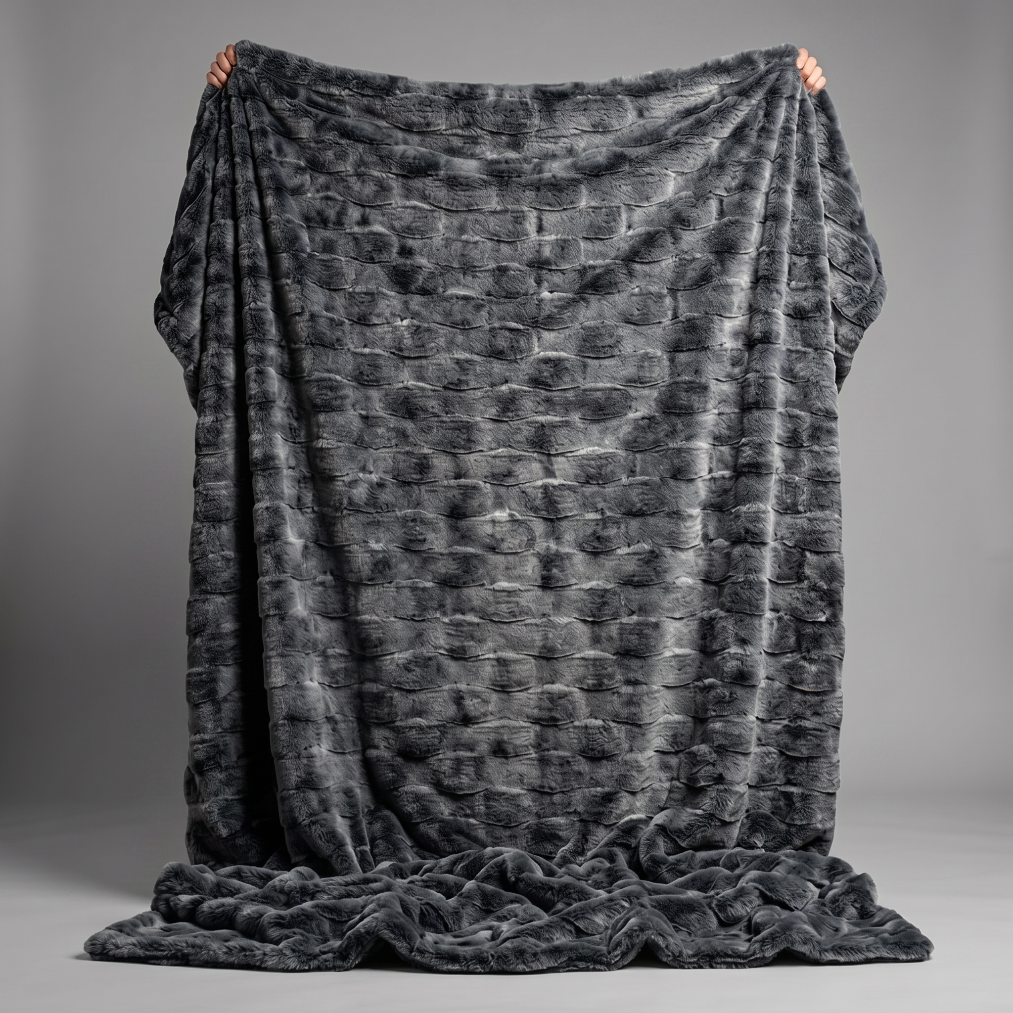 Charcoal ripple plush blanket with embossed faux fur texture