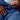 Man sleeping under a navy cooling comforter with smooth cool-touch fabric