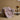 Pink ripple plush blanket draped over a chair