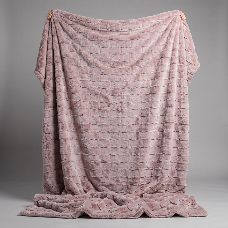 Pink ripple plush blanket with embossed faux fur texture